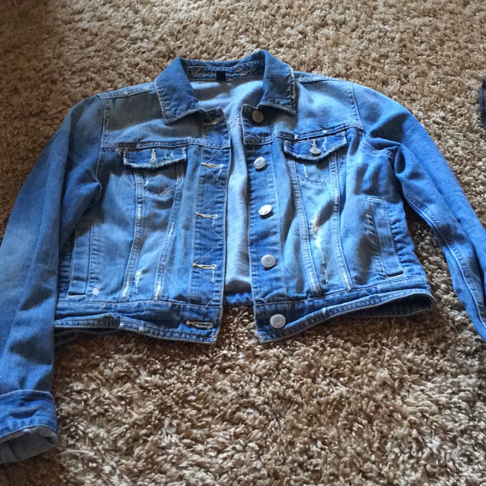 Distressed jean jacket